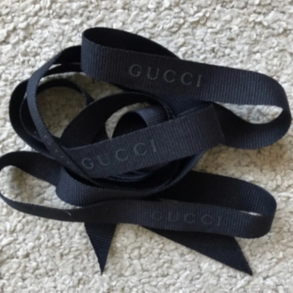 Authentic Gucci Ribbon. Black with a Gucci Logo. 176 cm.